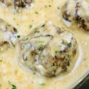 skillet full of creamy Swedish meatballs.