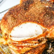 air fried whole chicken slices on a roasting tray.