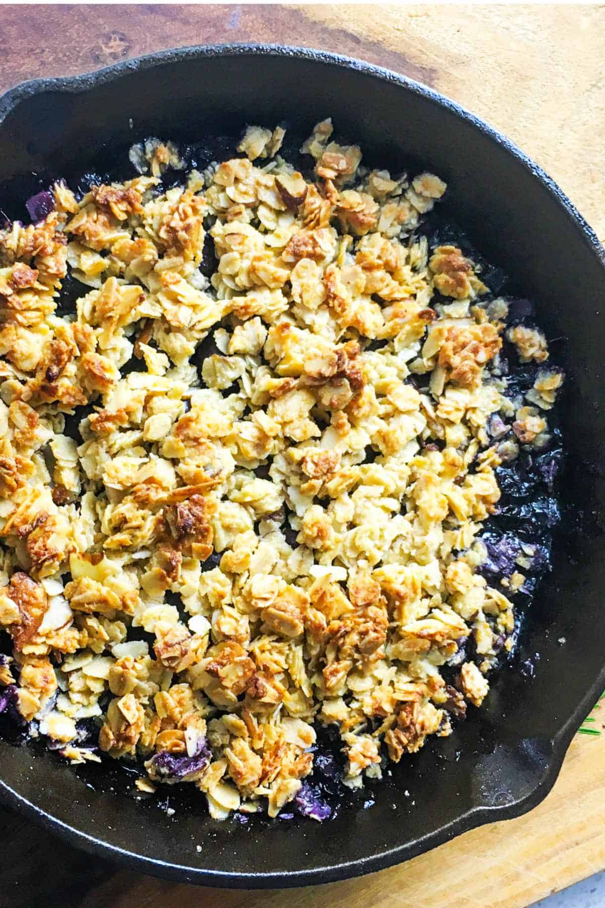 blueberry crisp from a cast iron skillet.