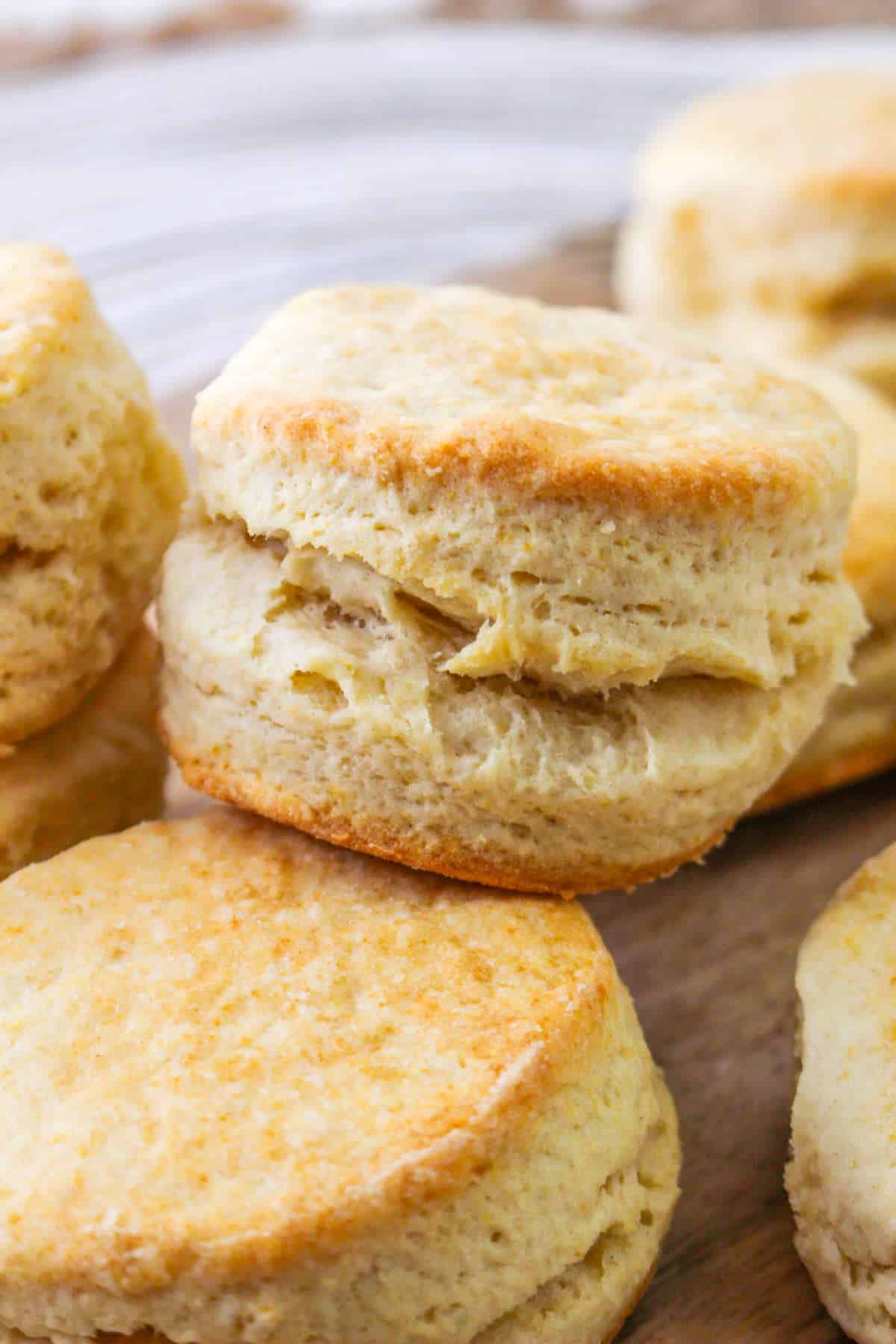 fluffy Crisco biscuits on a plate.