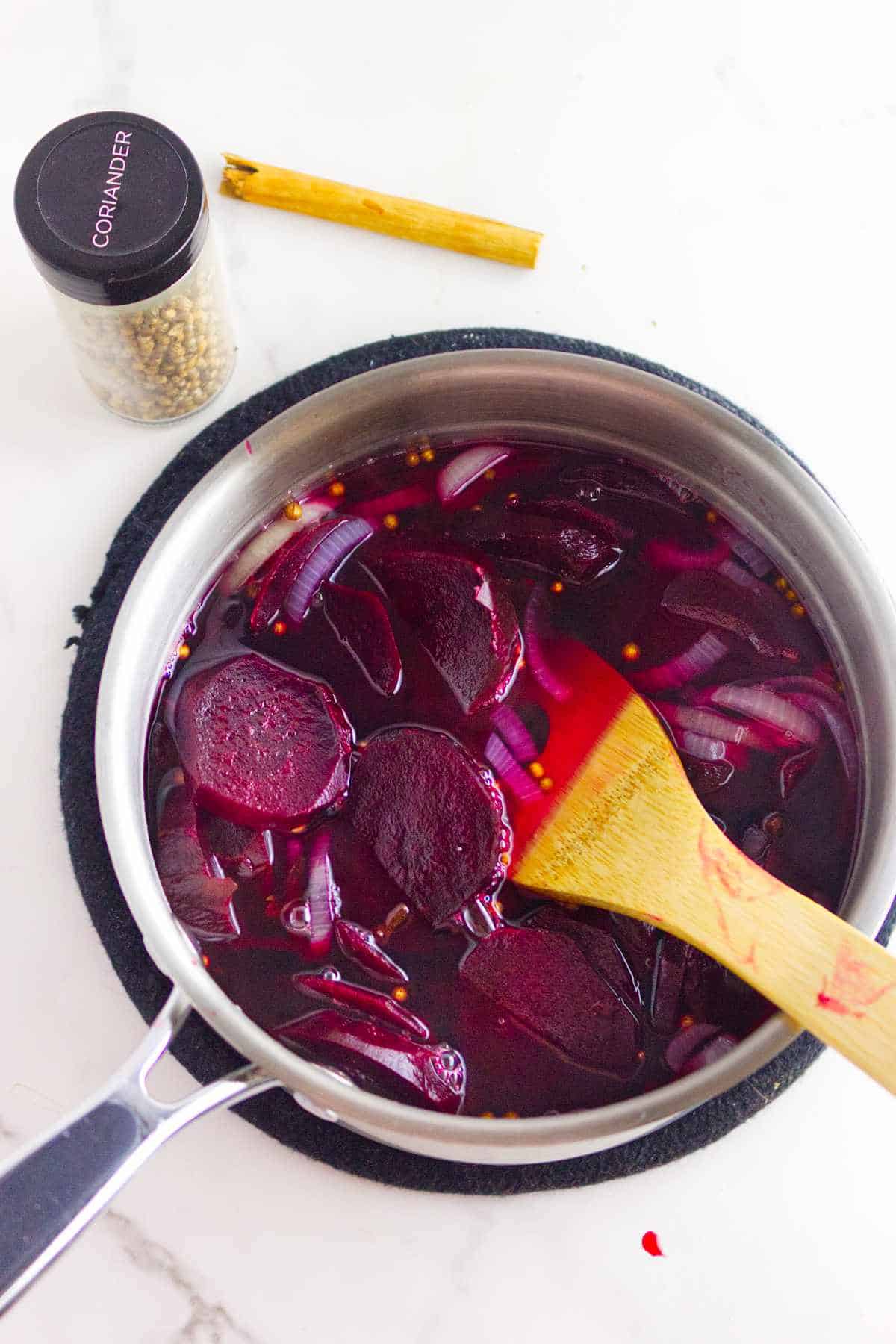 simmered beetroot, onions, and spices in a sweet vinegar brine.