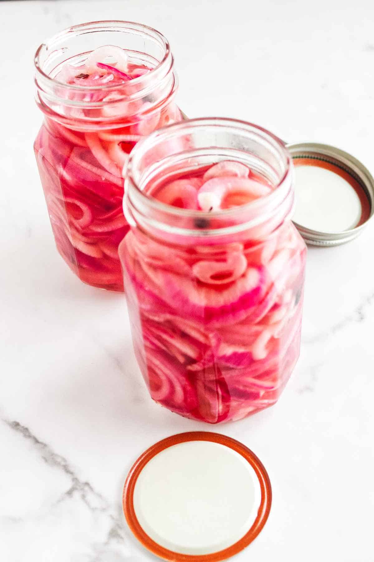 jar of hot packed red pickled onions.