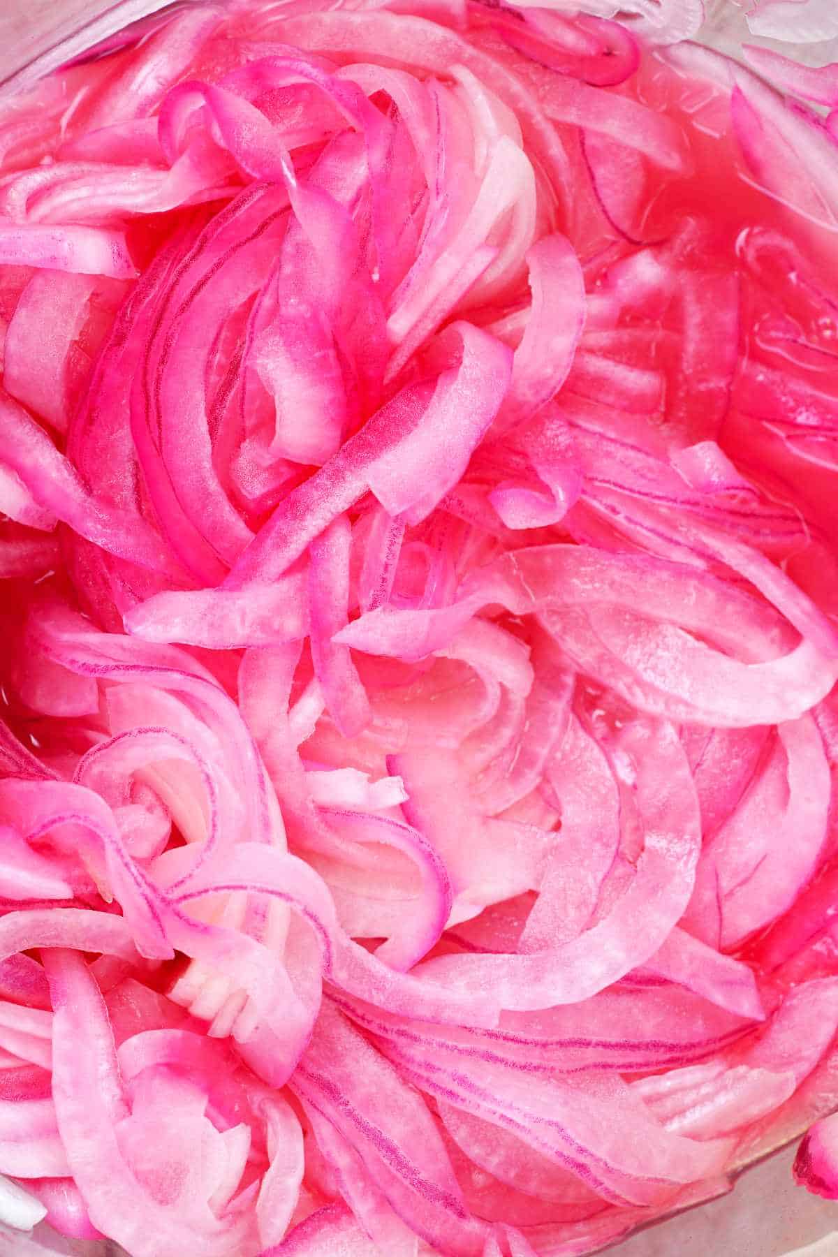 Bowl of pickled red onion.