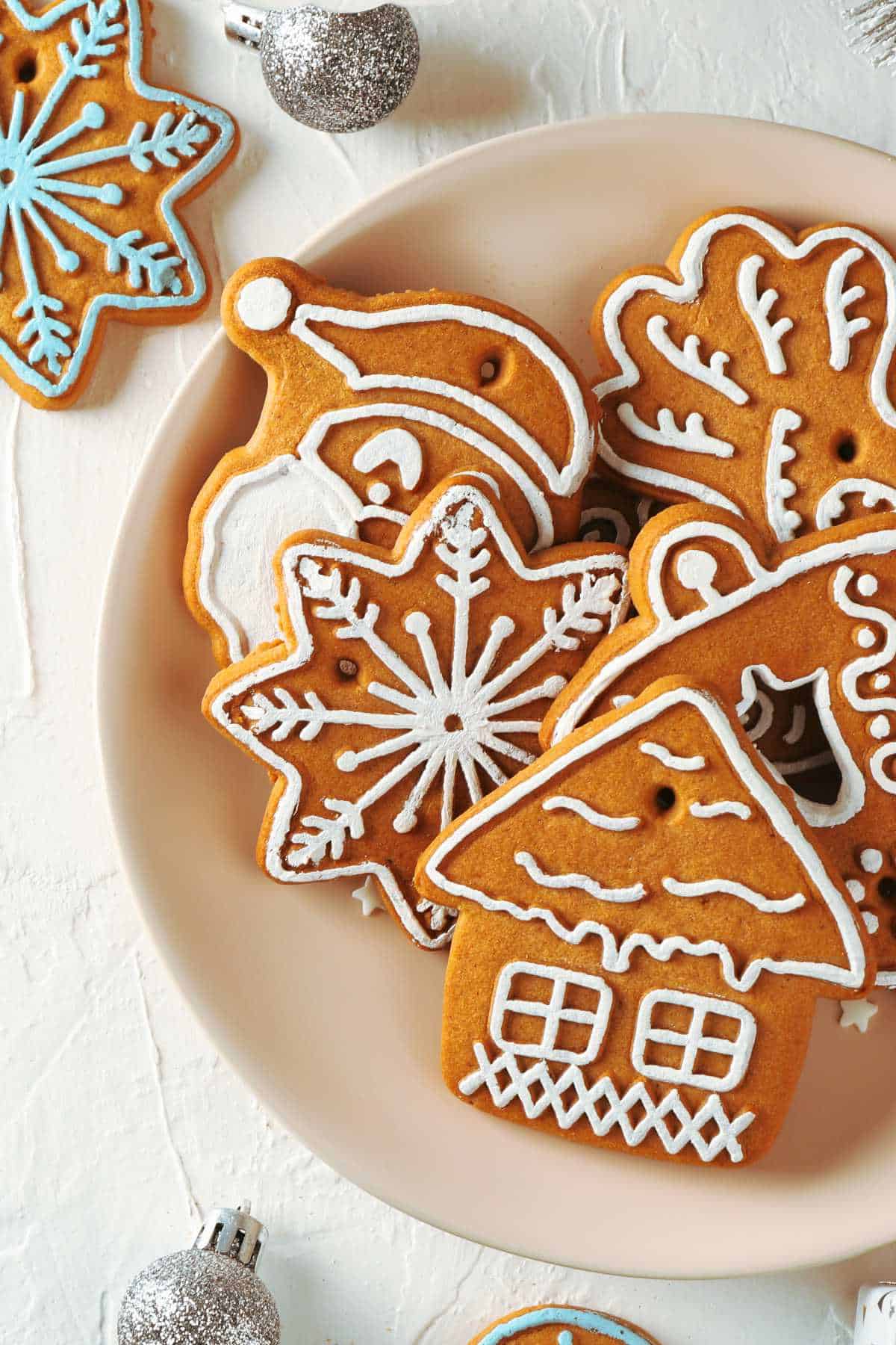 gingerbread cookies with royal icing outlining.