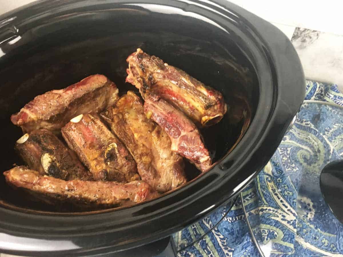 browned ribs in crockpot.