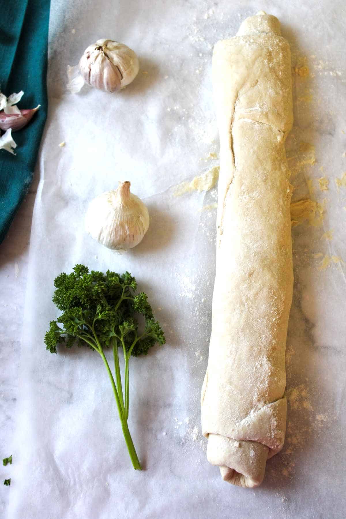 buttered dough rolled up.