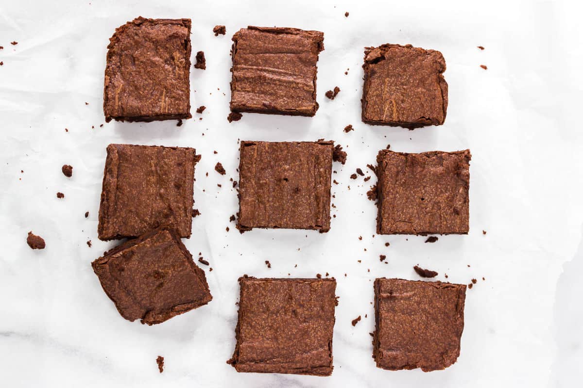 nine brownies freshly cut from pan.