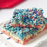 Three 4th of July Rice krispy treats on a small white plate
