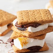 toasted marshmallows in graham crackers wtih chocolate.