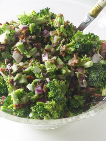 broccoli salad in a crystal bowl.