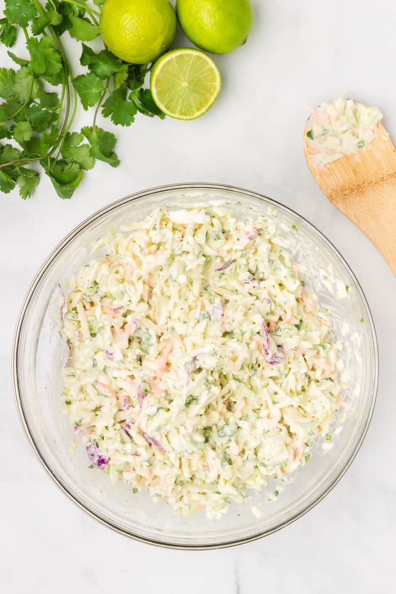 clear glass bowl of coleslaw.