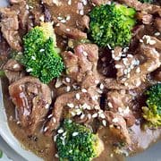 beef & broccoli stir fry in a skillet.