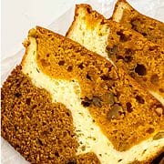 Slices of pumpkin bread with cream cheese filling.