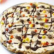 Chocolate chip cookie cake with Reeses Pieces.