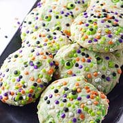 halloween sprinkle cookies on a platter.