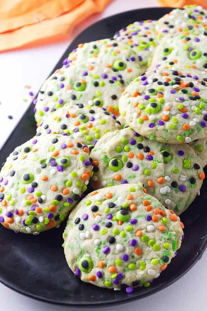 halloween sprinkle cookies on a platter.