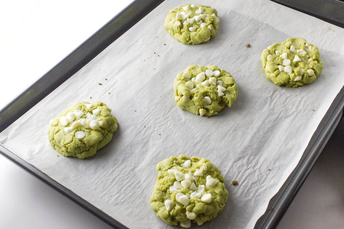 green matcha cookies on a cookie sheet read to bake.
