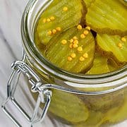 a bail jar full of bread and butter pickles.