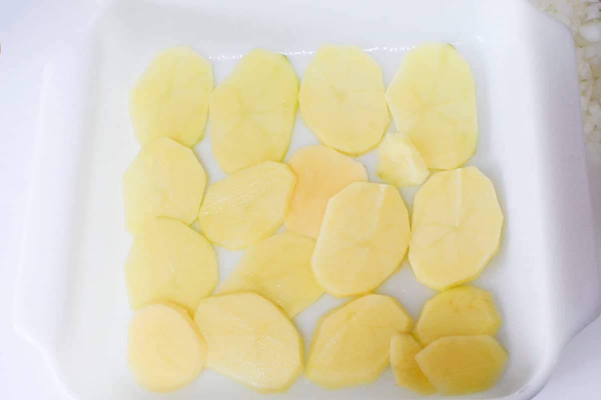 layered raw potato slices.