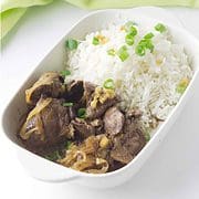 chicken liver adobo and rice in a serving bowl.