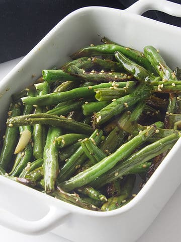 air fried green beans with seasoned with sesame oil and sesame seeds.