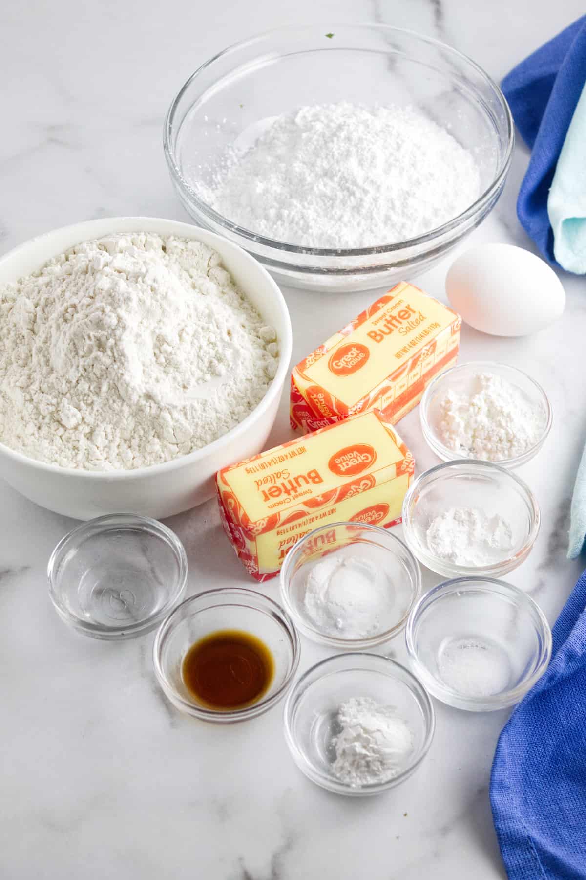 ingredients for frosted vanilla cookies.