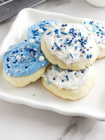 Hanukkah frosted soft vanilla cookies on a plate.