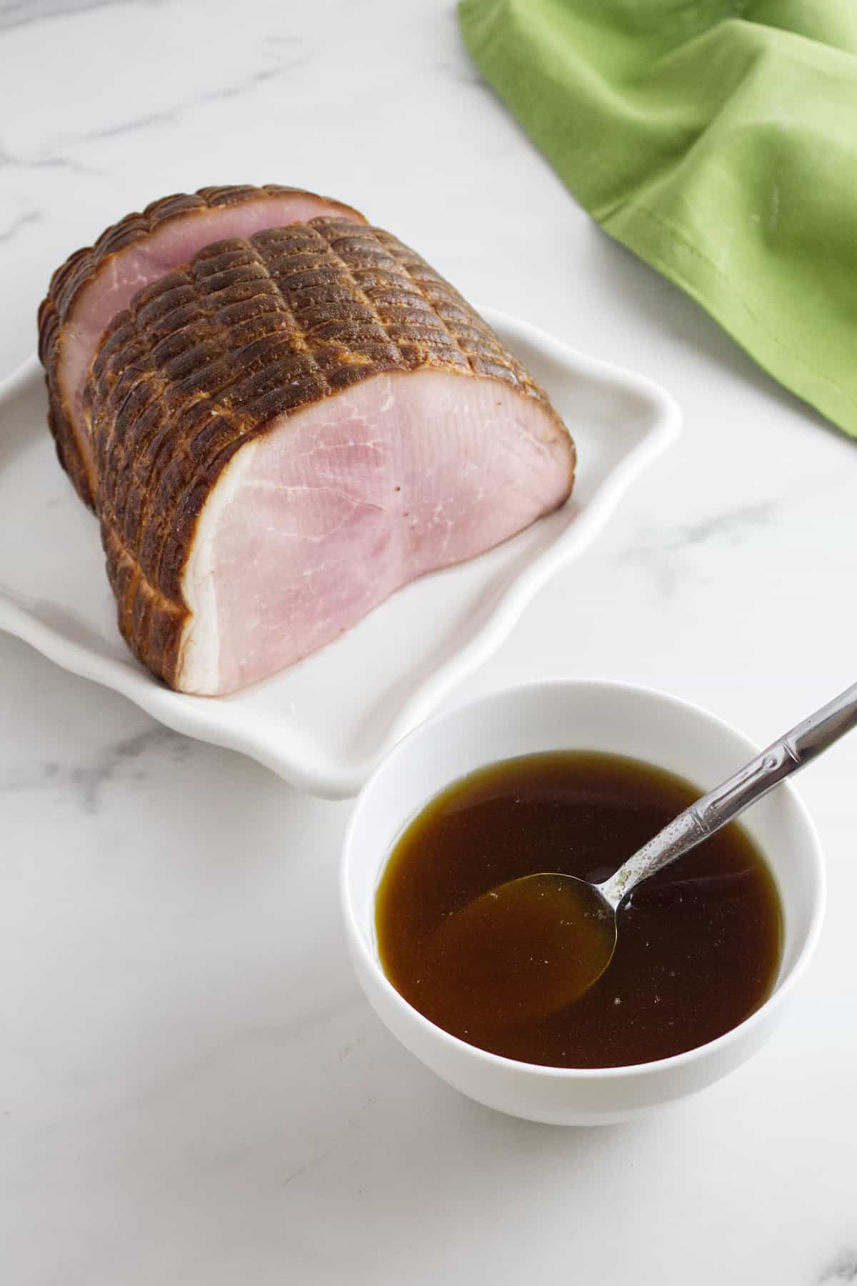 ham and glaze in a bowl.