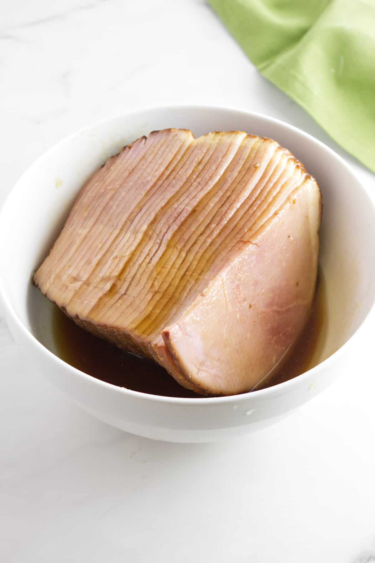 ham upside down in glaze marinating.