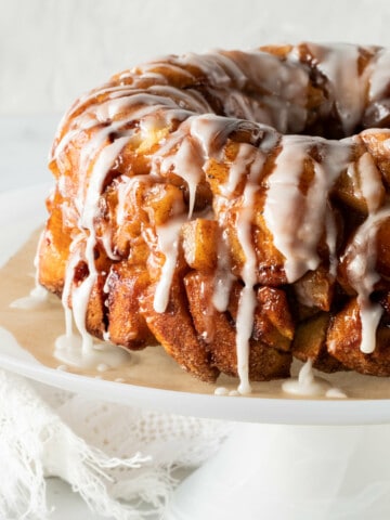 iced monkey bread on a cake plate.