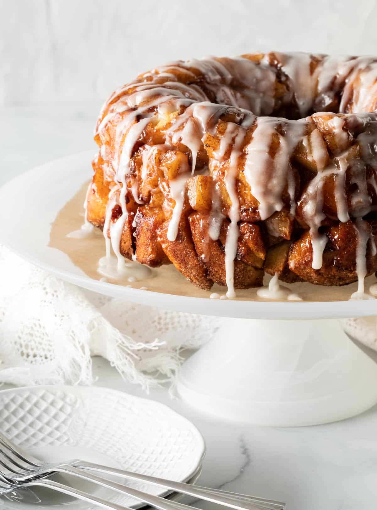 iced monkey bread on a cake plate.