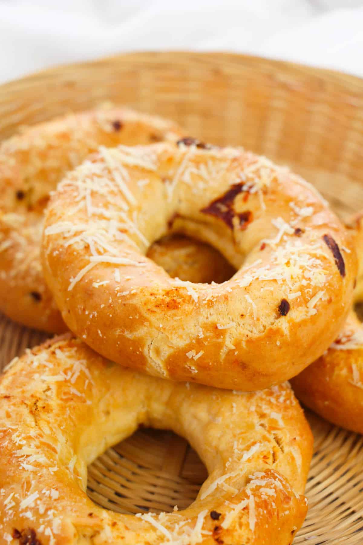 3 ingredient bagels with sundried tomato bagels using the weight watchers bagel recipe, in a basket.