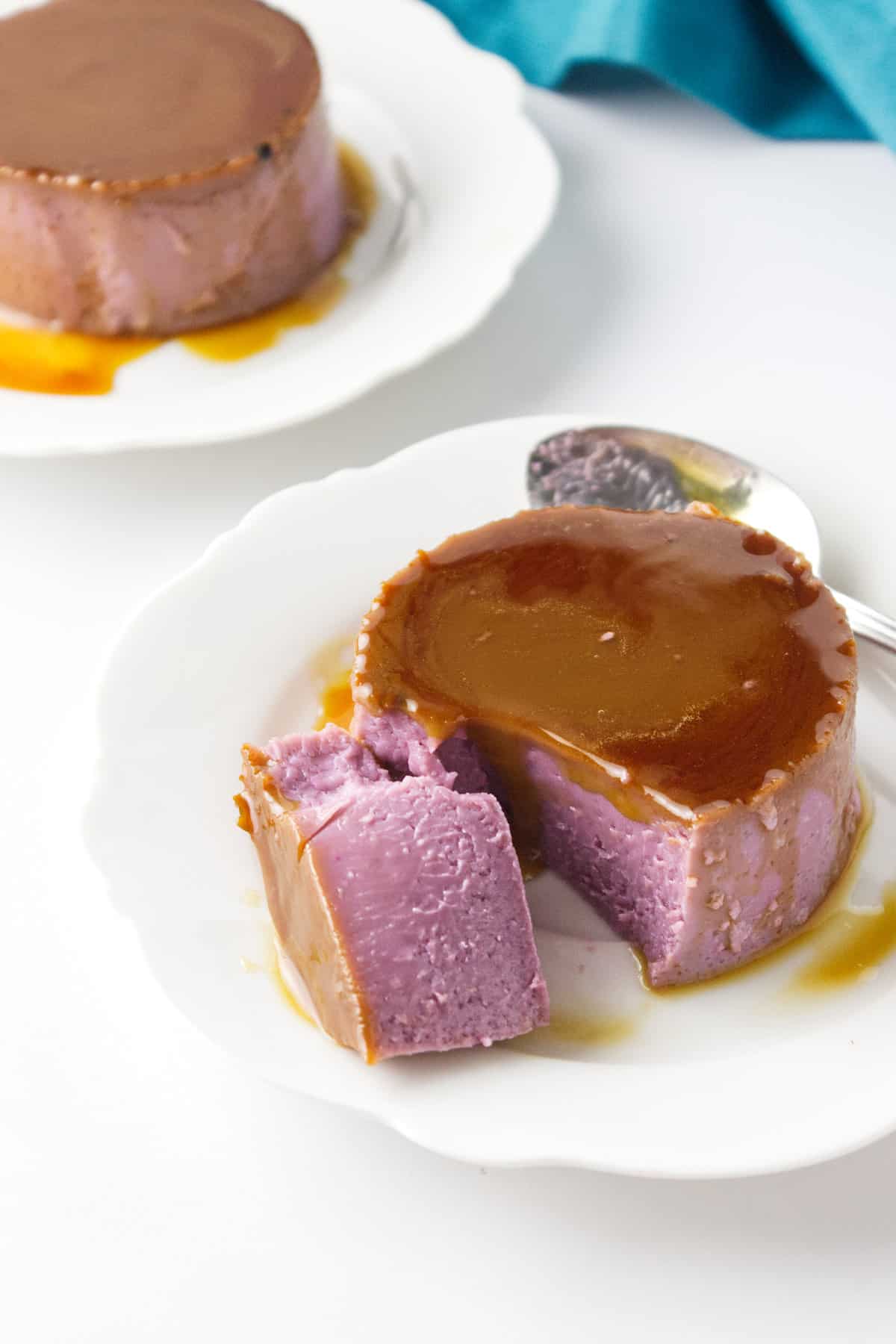 ube leche flan turned out in a saucer.