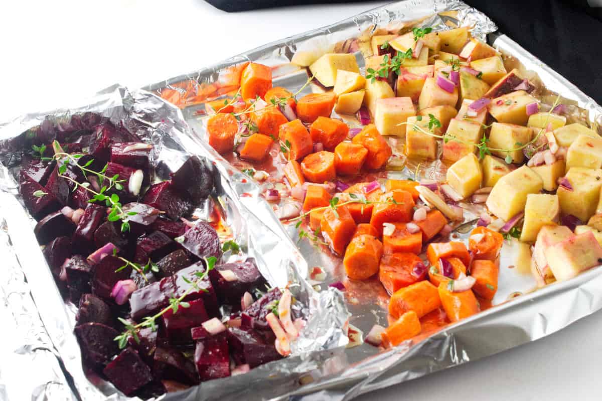 sheet pan with vegetables laid out for roasting.