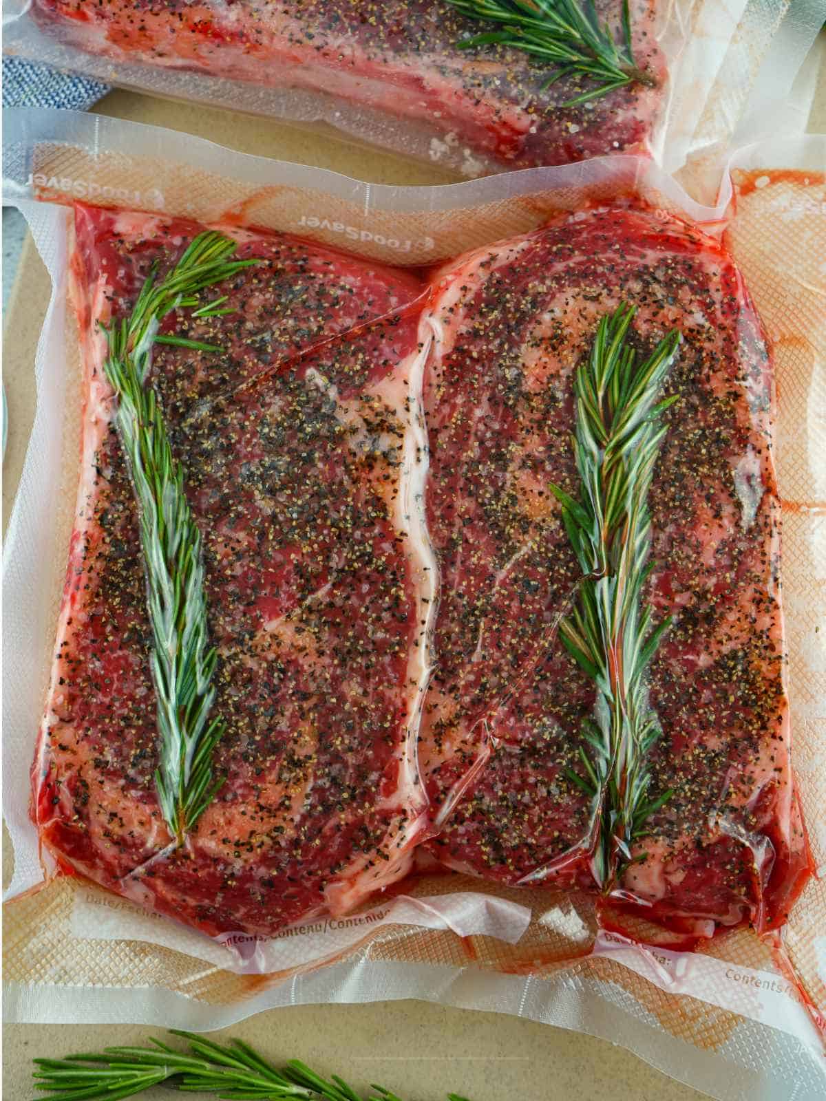 seasoned steaks sealed in a vacuum sous vide bag.