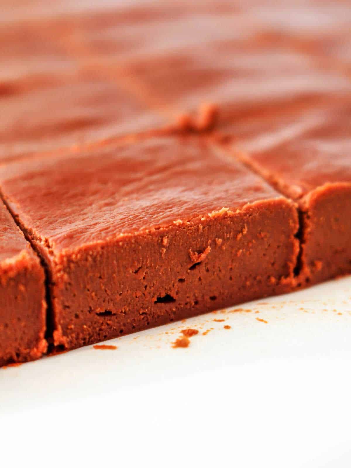 fudge slab on a counter freshly cut into squares.