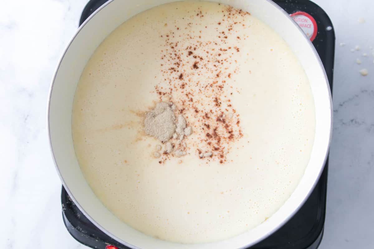 spices added to cream and butter sauce.