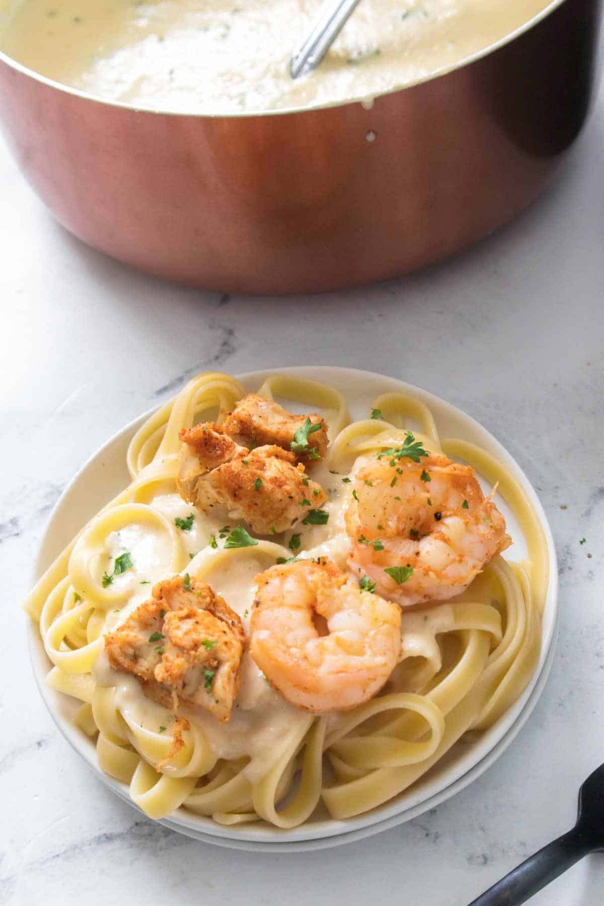 plate of cajun chicken and shrimp pasta.