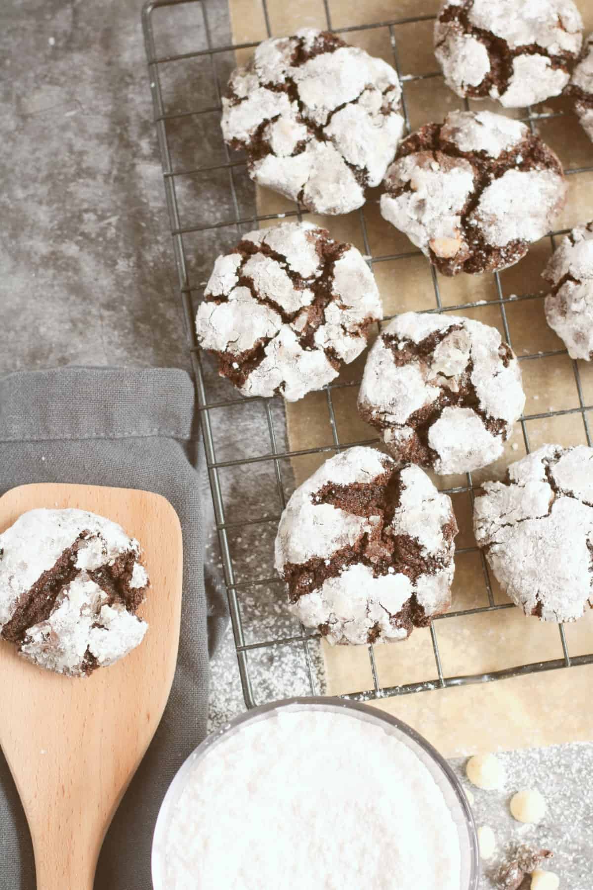 brownie crinkle cookies on a cooling rack.