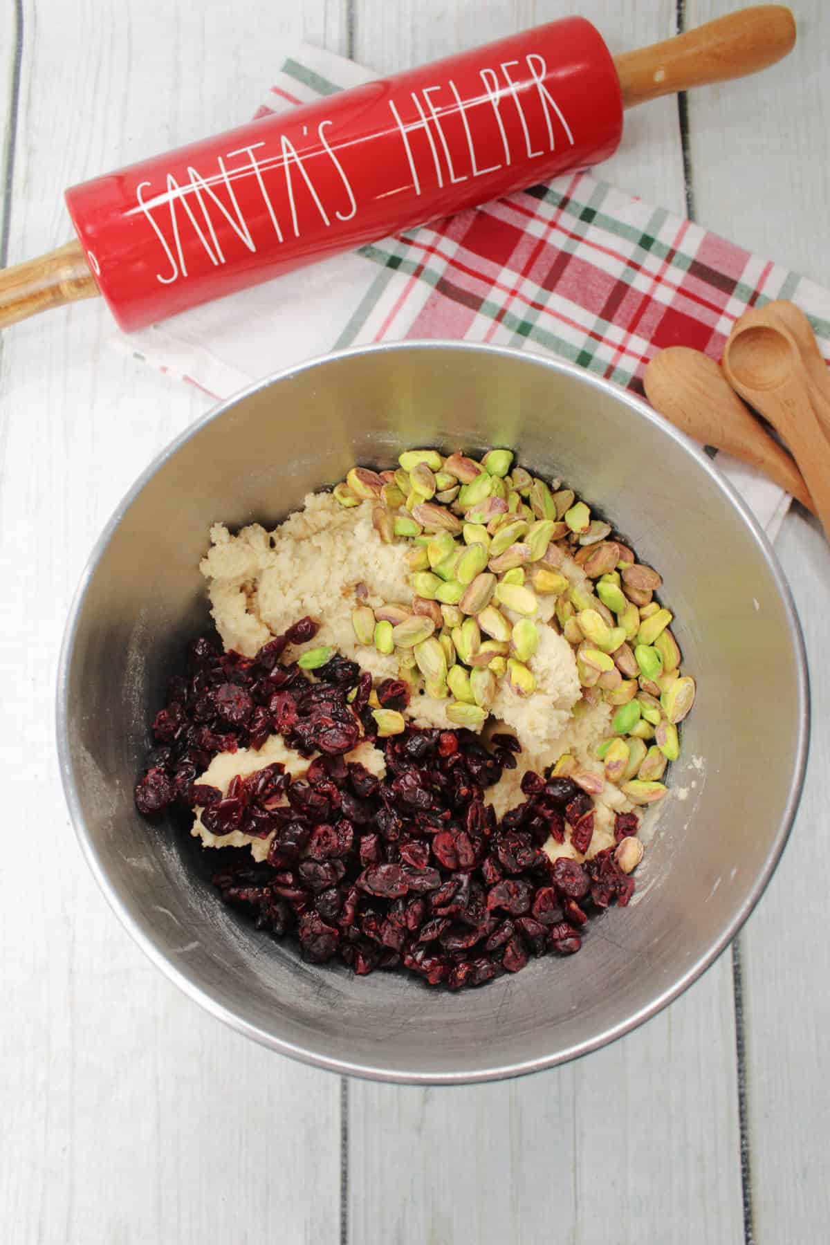 cranberries and pistachios added to cookie dough.