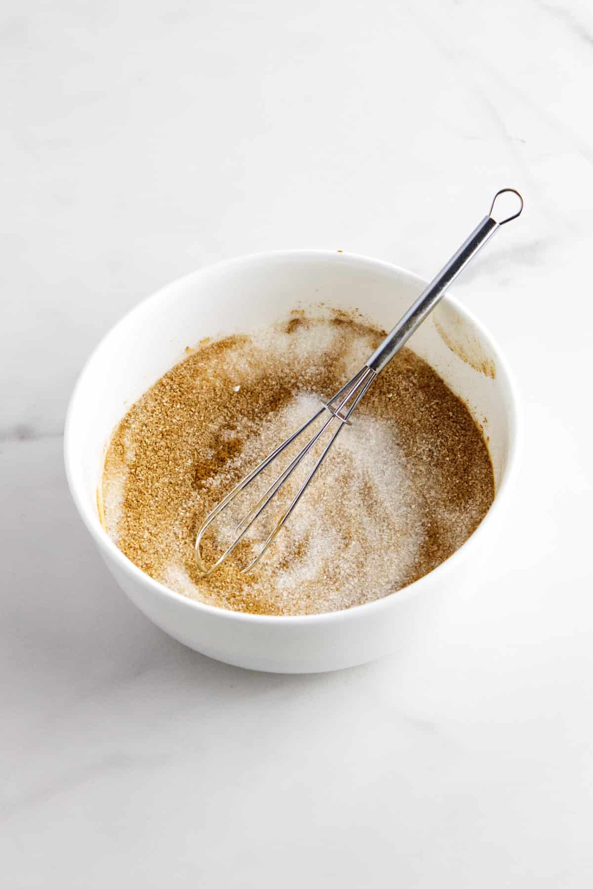 sugar and cinnamon whisked in a small bowl.
