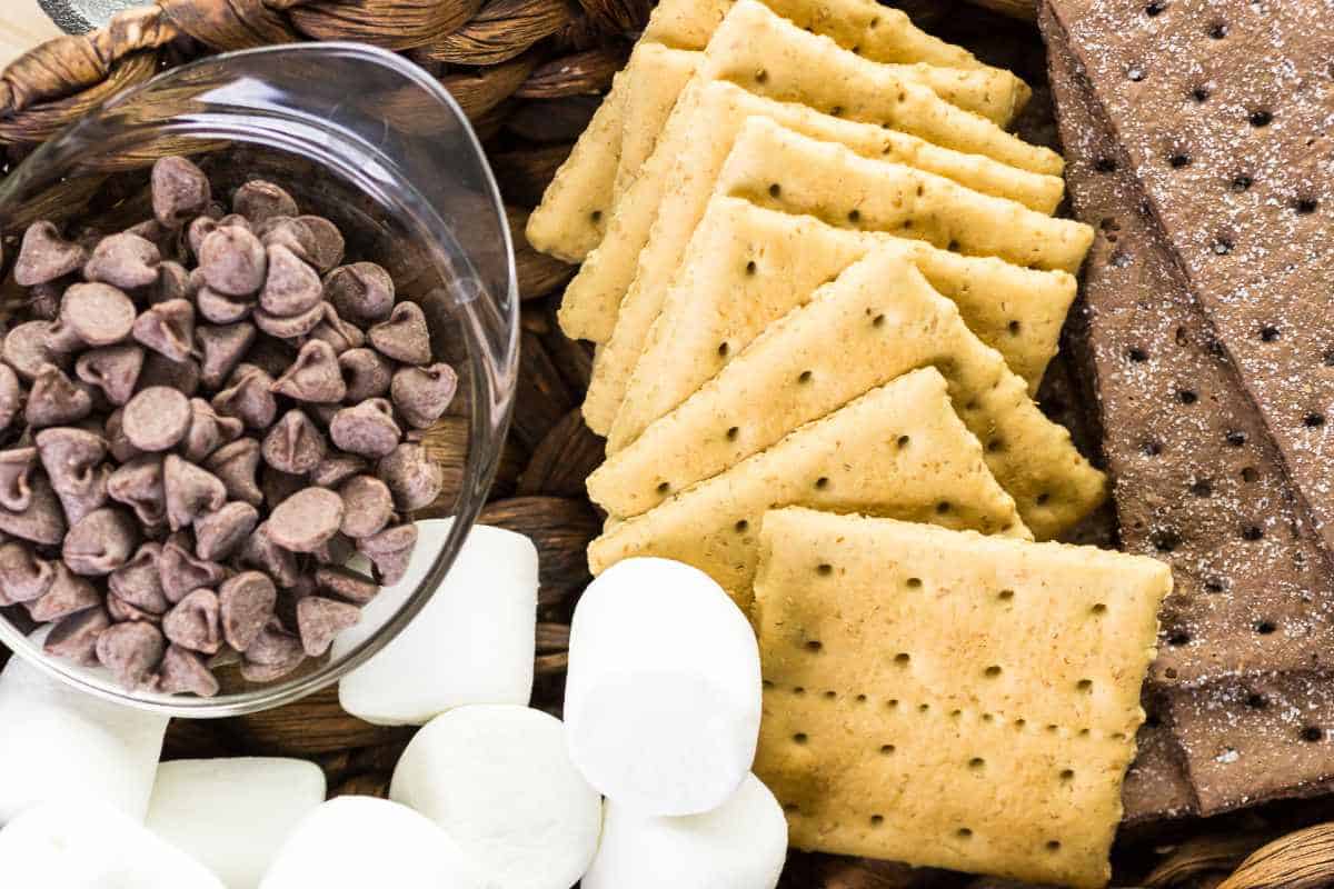 graham crackers and dipping cookies with mini chocolate chips and marshmallows for hot cocoa dip.