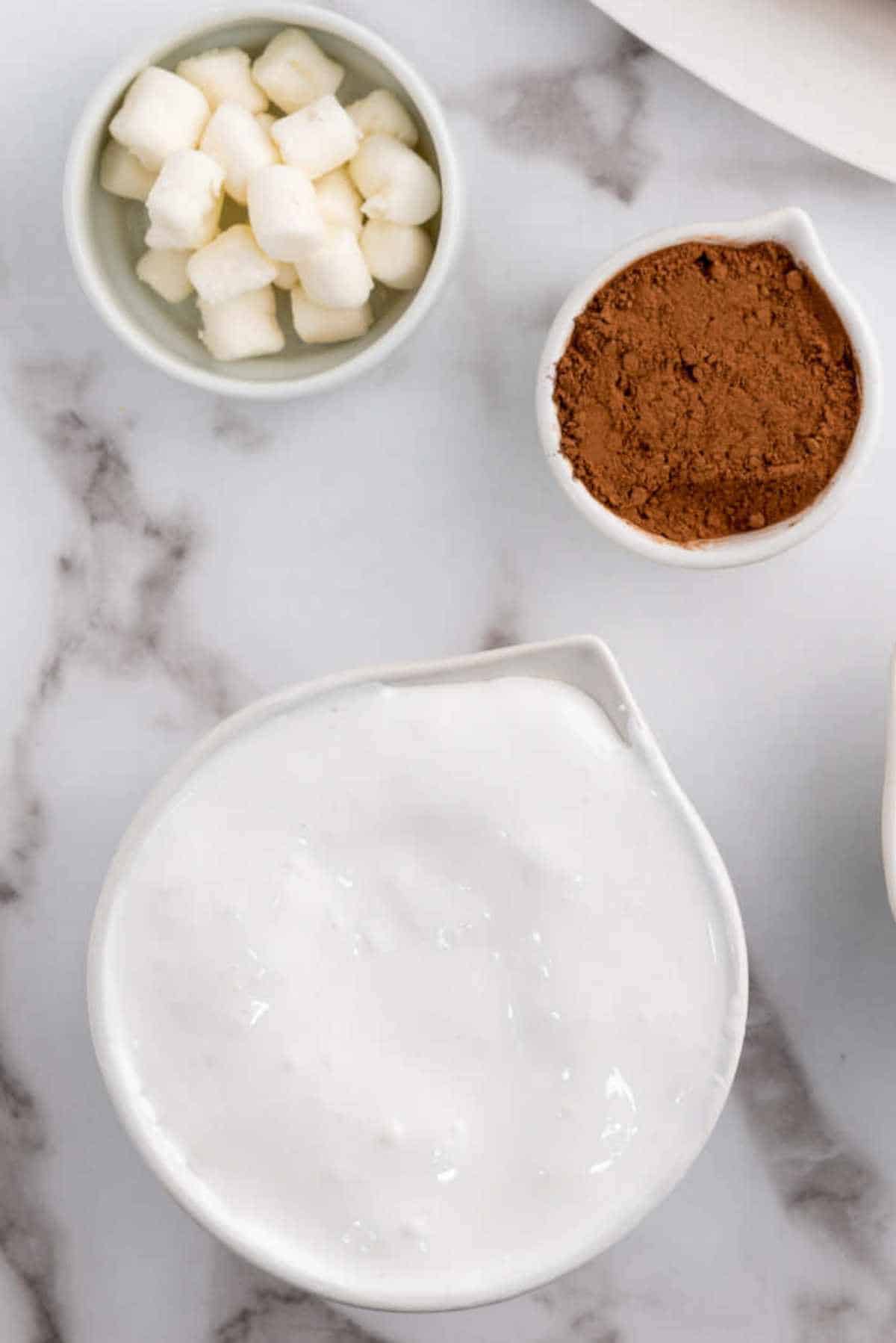 marshmallow fluff, cocoa powder, and mini marshmallows.