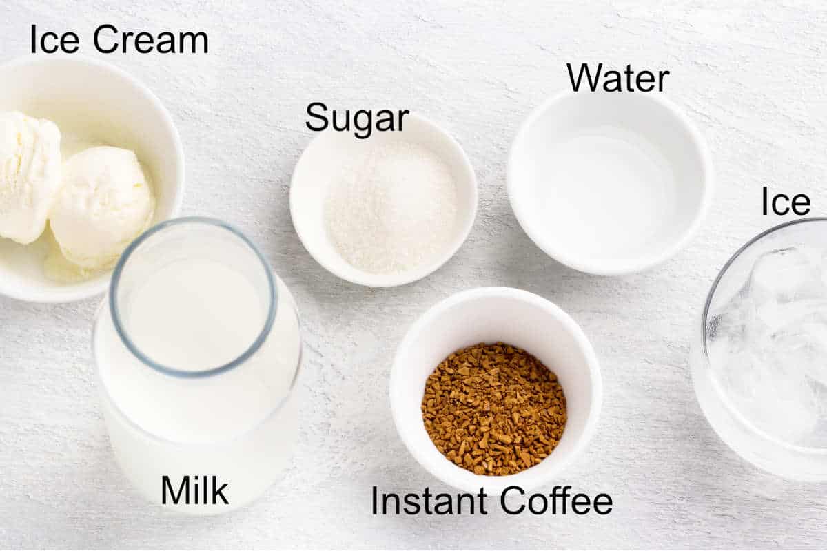Ingredients for iced dalgona coffee. Instant coffee, milk, ice cream,
