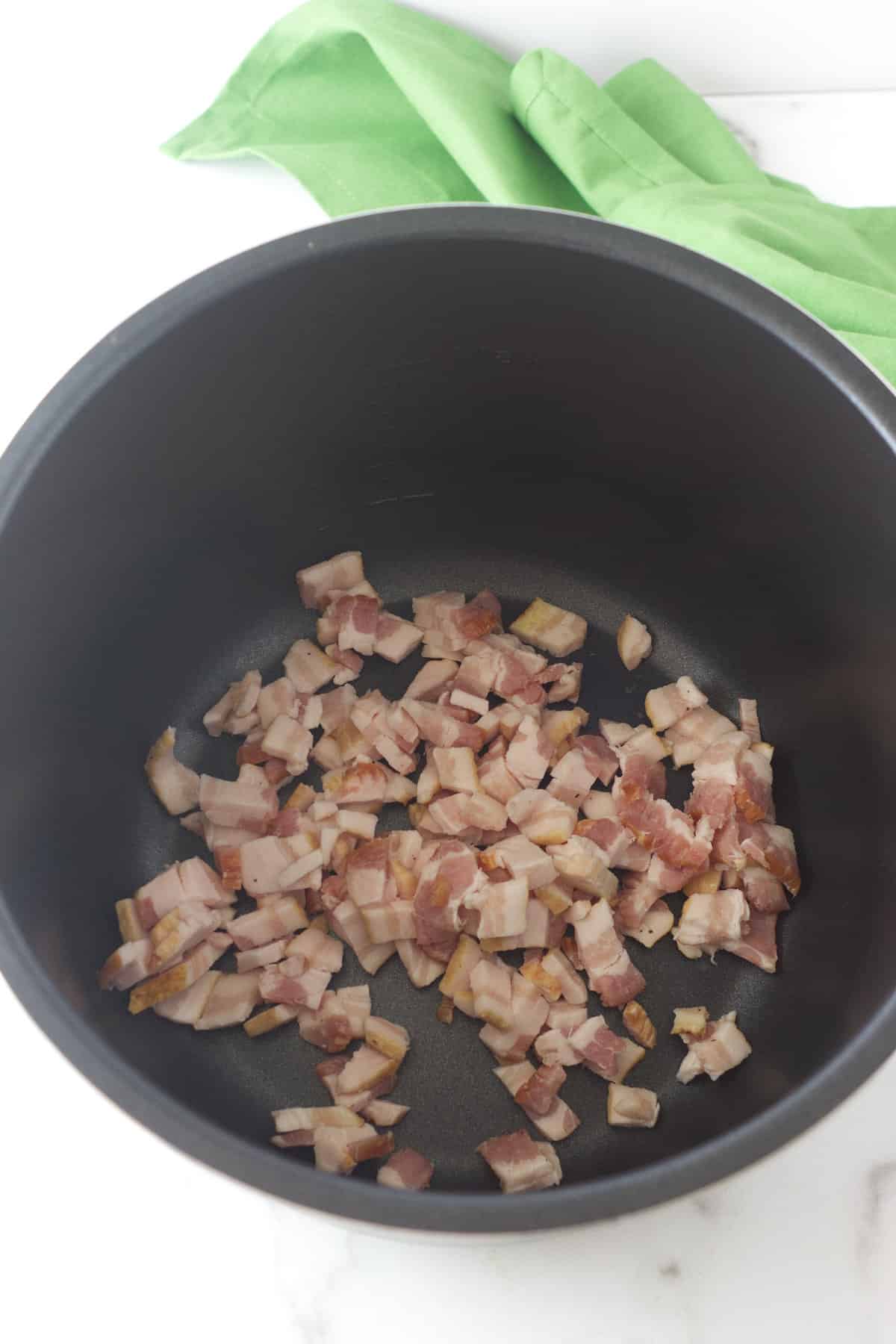 minced bacon in the bottom of an instant pot to saute.
