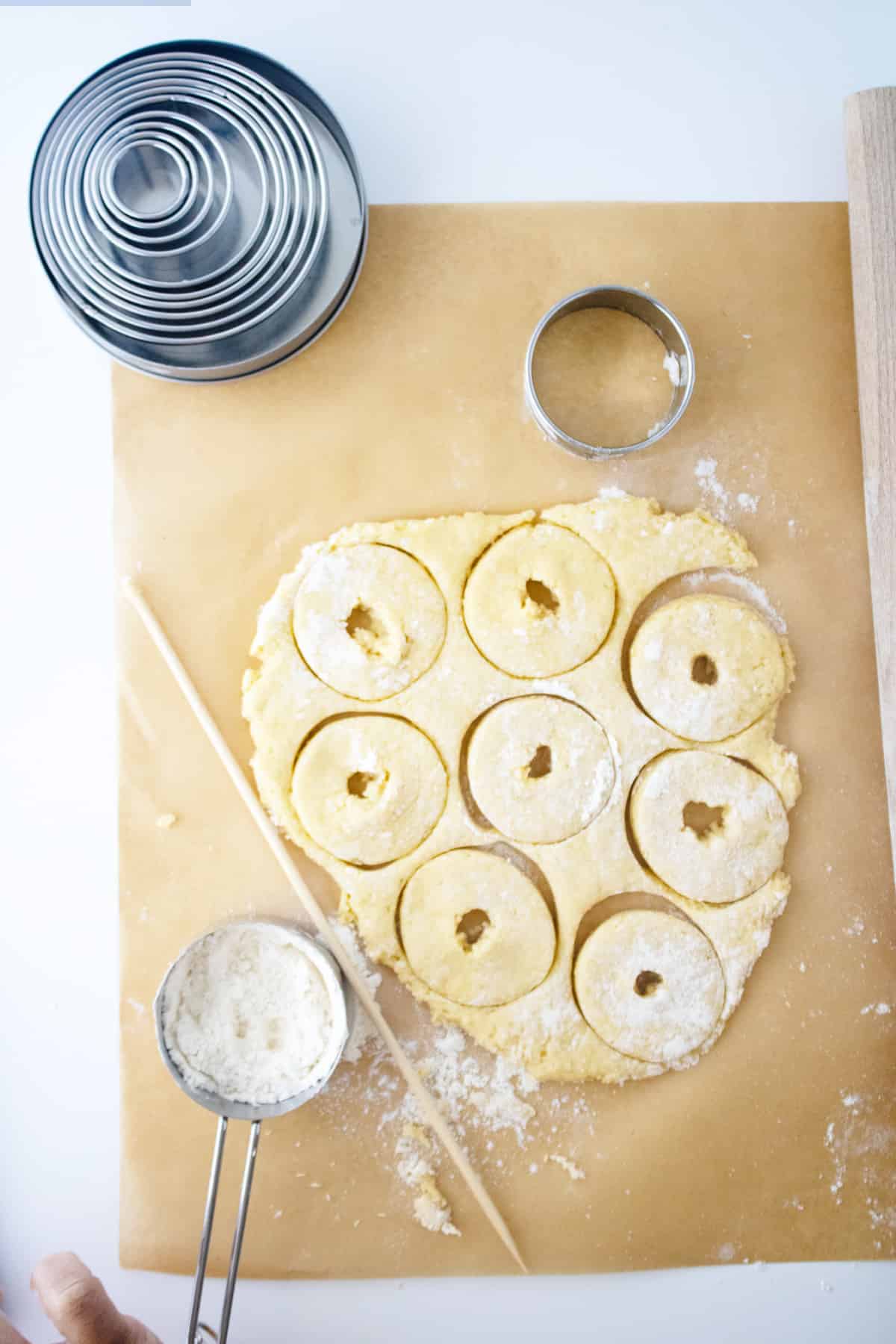 center holes created in dough circles.