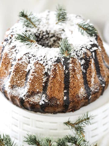 marbled bundt cake with coconut on top.