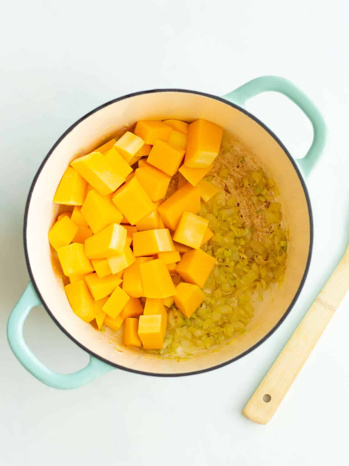 butternut, pumpkin, and carrot added to pot with sauteed vegetables.