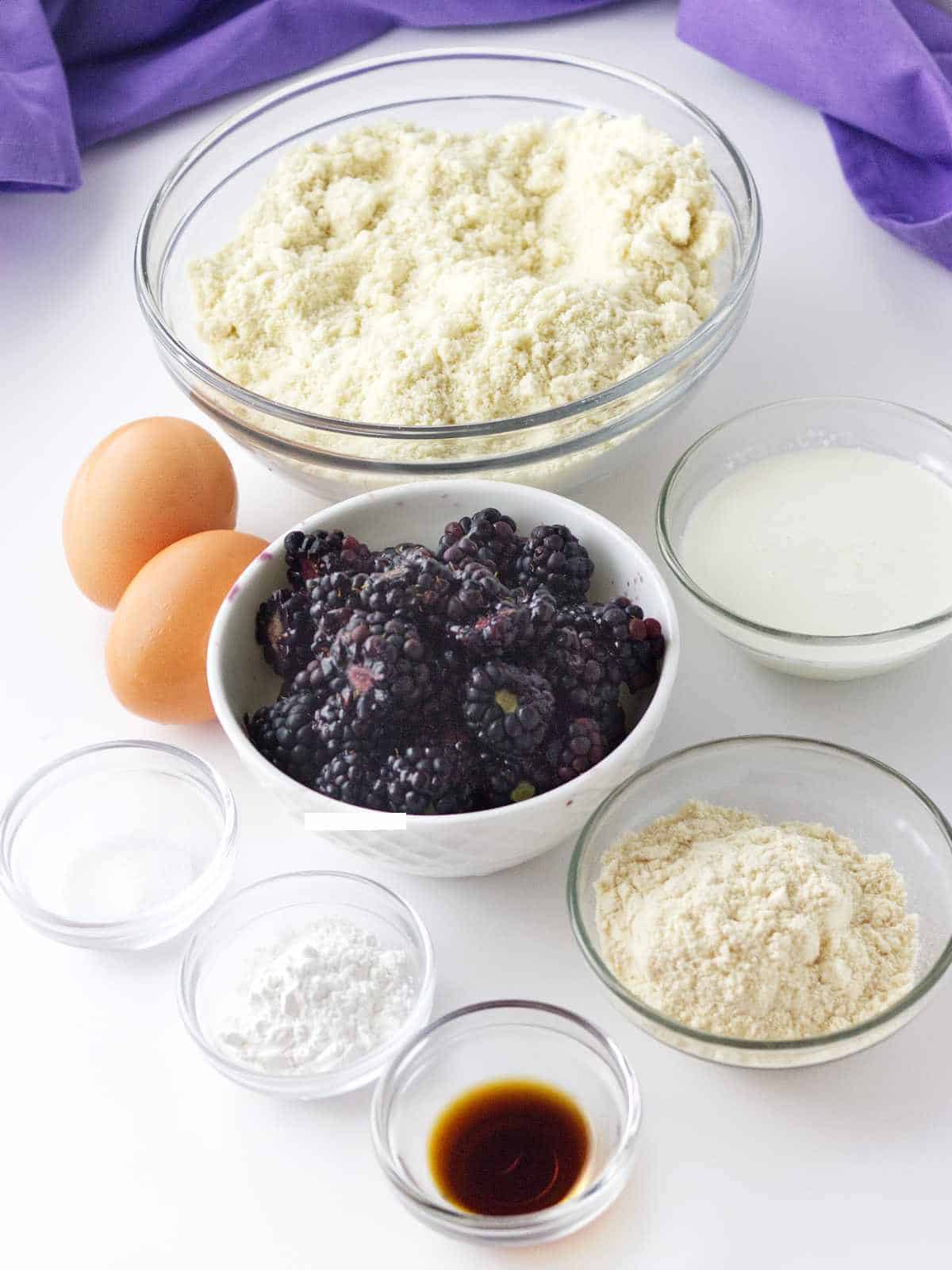 ingredients for making almond flour blackberry muffins.