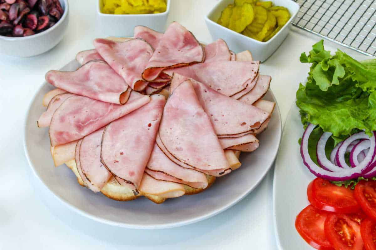 ham slices on a sandwich.